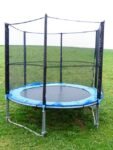 Rectangular garden trampoline with safety enclosure in a UK back garden