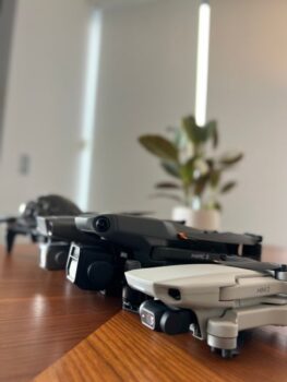 A selection of camera drones of different sizes displayed together