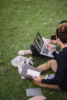 Student using a laptop while studying on campus