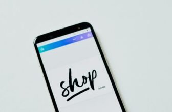 Phone showing an online booking site, representing how to spot a fake travel deal